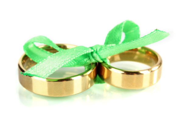 Wedding rings tied with ribbon isolated on white - Foto, Imagem