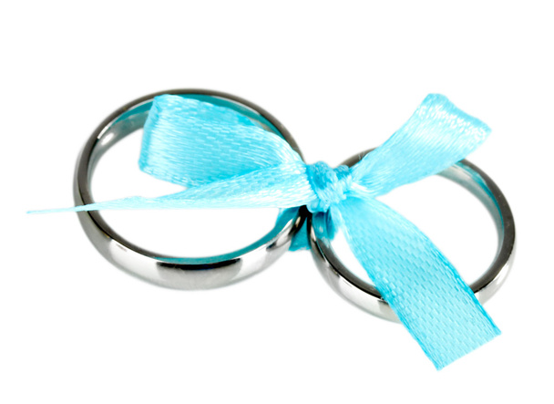 Wedding rings tied with ribbon isolated on white - Fotó, kép