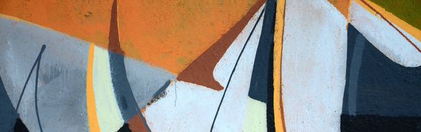 Frammento di graffiti colorati di street art con contorni e ombreggiature ravvicinate. Struttura di sfondo della cultura d'arte contemporanea giovanile. Colori grigio e arancio
 - Foto, immagini