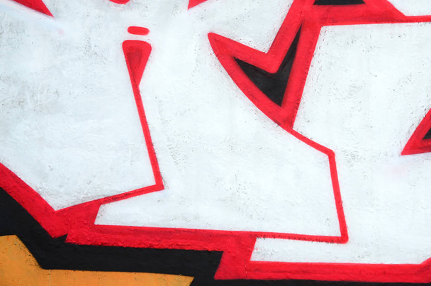 Фрагмент кольорових картин вуличного мистецтва графіті з контурами і затіненням крупним планом. Фундаментальна текстура молодіжної культури сучасного мистецтва. Помаранчевий, червоний і чорний кольори
 - Фото, зображення