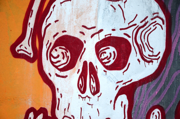 Fragment van gekleurde straatkunst graffiti schilderijen met contouren en arcering close-up. Achtergrond textuur van de jeugd hedendaagse kunst cultuur. Oranje, rode en zwarte kleuren - Foto, afbeelding