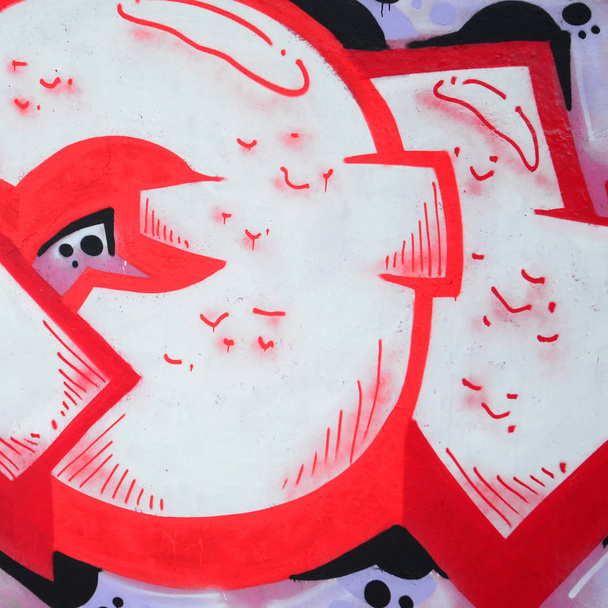 Fragmento de pinturas de graffiti de arte urbano de colores con contornos y sombreado de cerca. Textura de fondo de la cultura del arte contemporáneo juvenil. Colores rosa rojo y negro
 - Foto, imagen