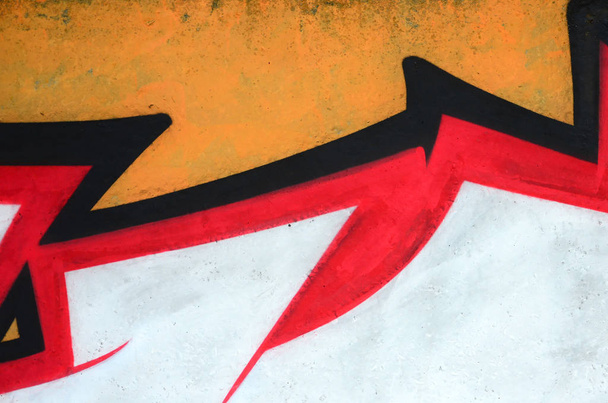 Fragmento de pinturas coloridas de grafite de arte de rua com contornos e sombreamento de perto. Textura de fundo da cultura da arte contemporânea juvenil. Cores laranja, vermelho e preto
 - Foto, Imagem