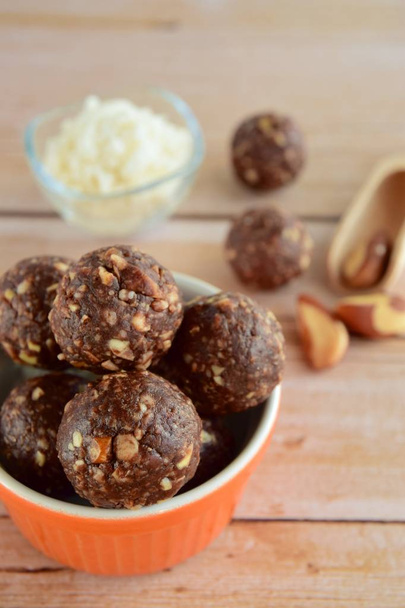 Healthy organic brazil nut coconut chocolate energy balls - Fotoğraf, Görsel