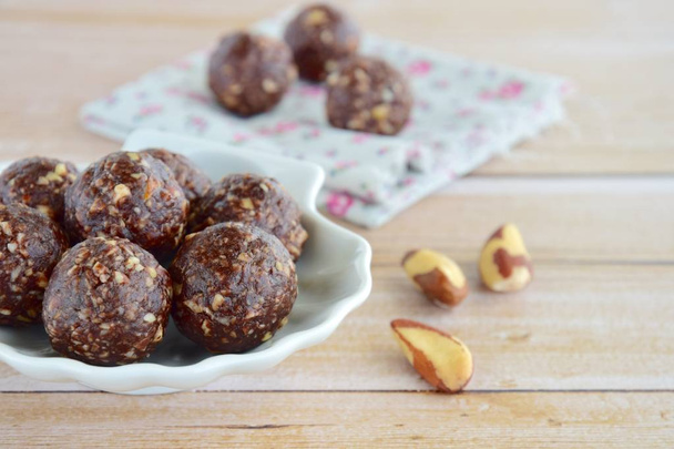 Healthy organic brazil nut coconut chocolate energy balls - Foto, imagen