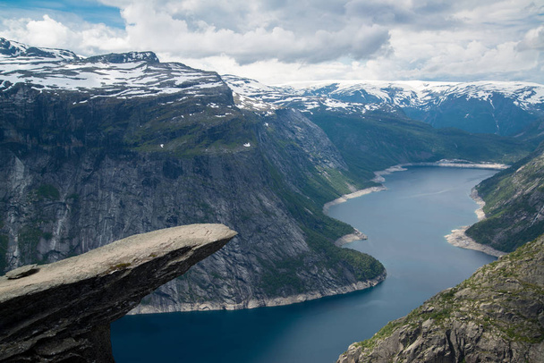 The summer view of Trolltunga cliff (The Troll's tongue) in Odda - 写真・画像