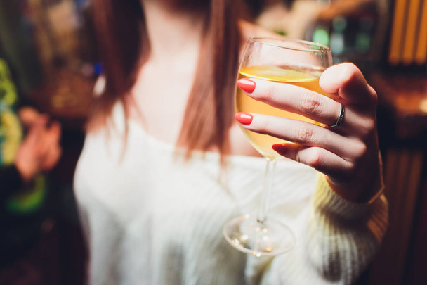 Glasses of wine in the hands of women. - Foto, imagen