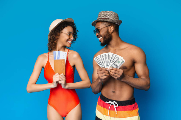 Happy african american man and woman took everything for summer travel - Photo, Image