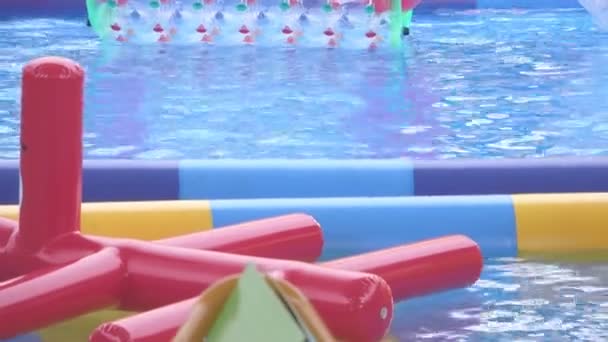 swimming pool water and inflatable shaped air mattress - Footage, Video