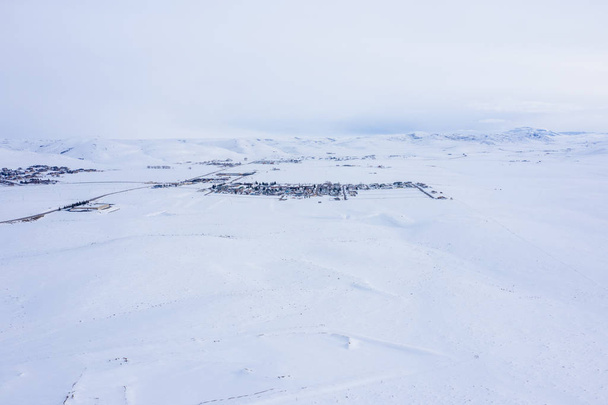 Aerial photo town covered in snow - Foto, immagini