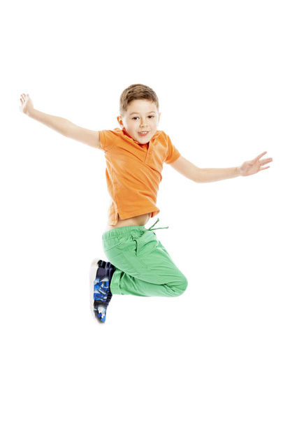 Cute boy in a jump, full height. Isolated on white background. - 写真・画像