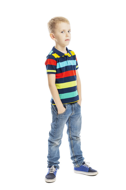 Standing boy in full growth in jeans and a bright T-shirt. Isolated on a white background.  - Foto, immagini