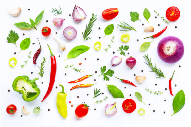 Various fresh vegetables and herbs on white background.  - Zdjęcie, obraz