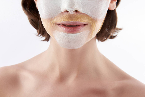 Low part portrait of smiling woman with face mask - Фото, зображення