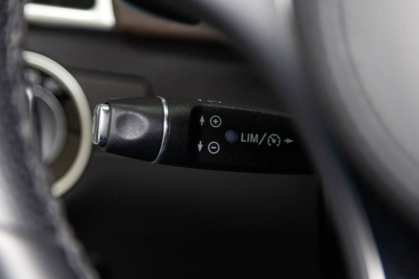 The shift lever to set the automatic cruise control speed inside - Photo, Image