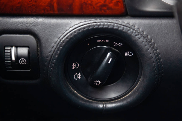 Close-up on the headlight switch control buttons and automatic a - Photo, Image