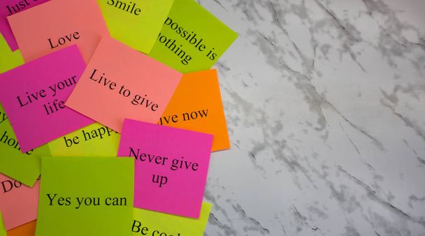 Motivational words on colorful stickers on a marble table. Business plan, strategy, concept, future. Copy space, creativity, project, art. Vision board. - Photo, Image