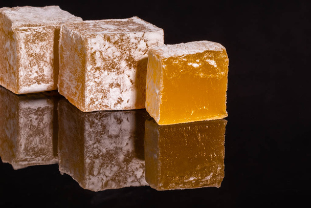 Turkish delight or rahat lokum. East sweet which can be used as a background - Foto, afbeelding