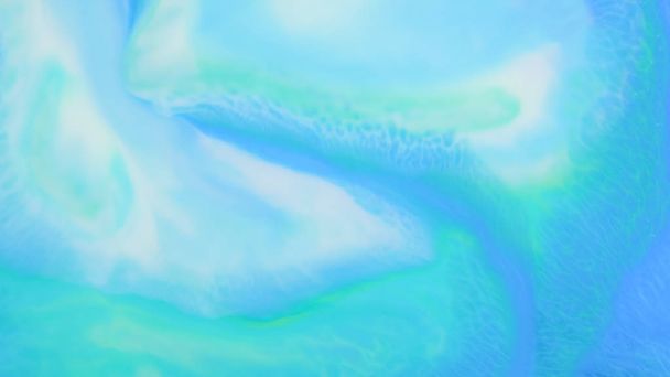 Fluid art. Turquoise abstract background on the liquid. Holographic blue-green background. Multicolored fluid stains. Widescreen - Fotoğraf, Görsel