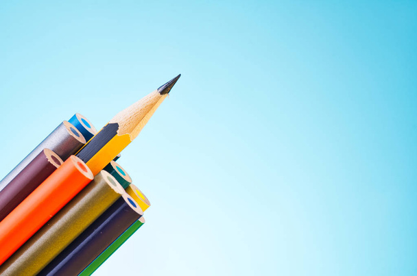 colourful pencils over beautiful reverberation gradient background - Photo, Image