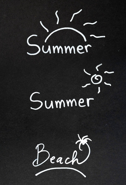 summer word on black chalk board - 写真・画像