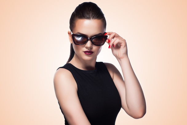 Close-up portrait of beautiful and fashion girl in sunglasses - 写真・画像