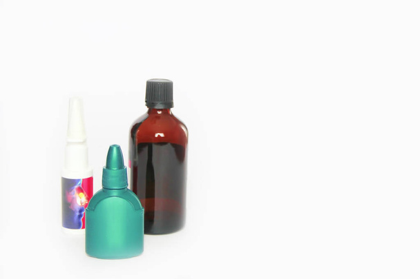 multi-colored medical containers, jar and spray for medicine on a white background - Foto, Imagen