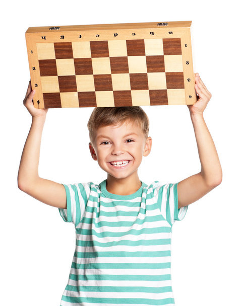 Boy with chessboard - Fotoğraf, Görsel