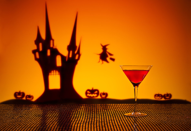 Cosmopolitan cocktail in Halloween setting - Photo, Image