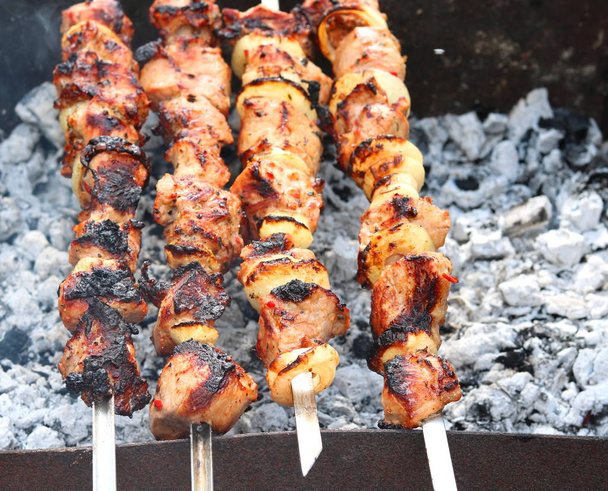 Barbecue skewers with juicy appetizing delicious meat closeup - Photo, Image