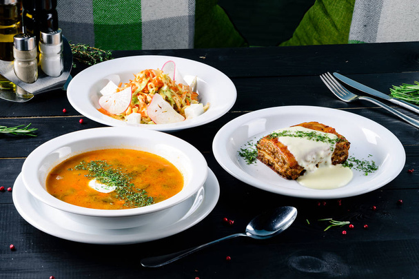 Enjoy your meal. Set of three delicious dishes served on a restaurant table - Фото, зображення
