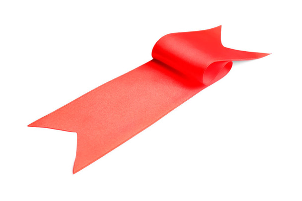 Egyszerű piros szalag fehér háttér. Ünnepi dekoráció - Fotó, kép