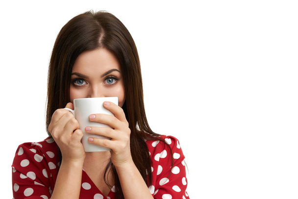 Caucasian brunette woman with mug of coffee isolated over white background - Foto, Imagem