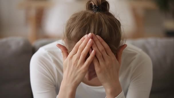 Sad young woman feeling stressed worried about unwanted pregnancy - Video, Çekim
