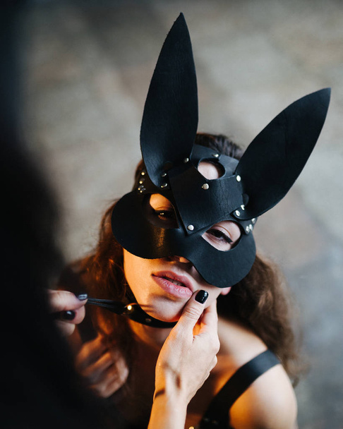 Girl in a rabbit's leather mask - Foto, afbeelding