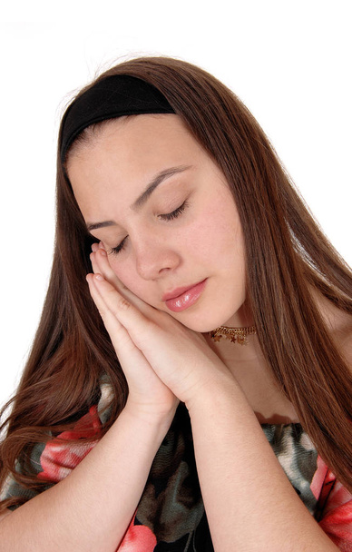 Sleeping young teenager on her hands - Photo, Image