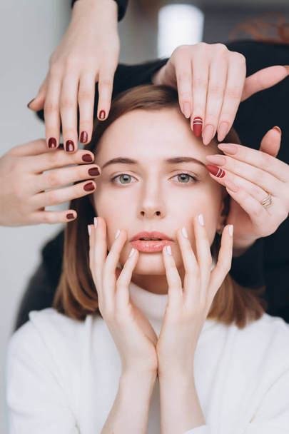 Girl face and hands that make different beauty salon service - Photo, Image