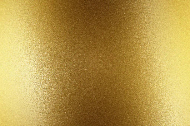 Licht auf goldener Stahlwand, abstrakter Texturhintergrund - Foto, Bild
