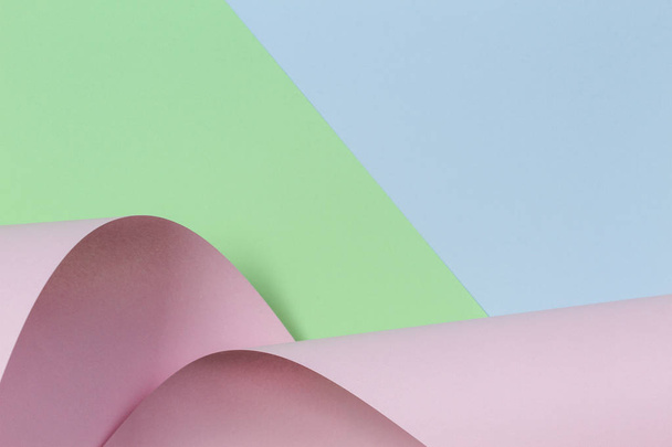 Abstracte achtergrond. Pastel roze, groen, blauw kleur papier in geometrische vormen - Foto, afbeelding