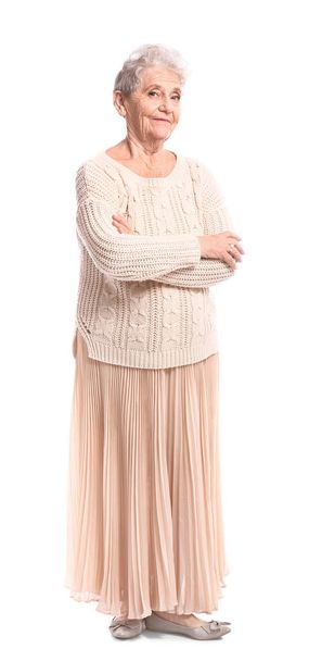 Portrait of senior woman on white background - Фото, зображення