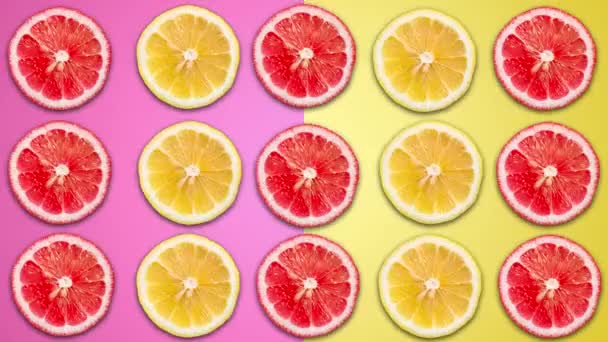 Абстрактна фіолетова і жовта кольорова анімація нарізаного лимона і грейпфрута на пасі
 - Кадри, відео