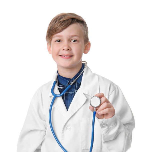 Portrait of little doctor on white background - 写真・画像