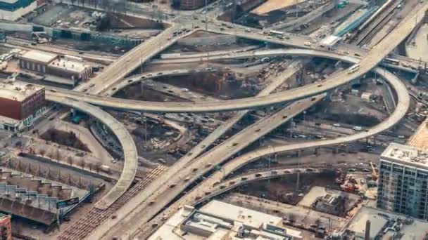 4K UHD top view time-lapse of car traffic on highway road intersection in Chicago, USA. Transportation or city life concept - Felvétel, videó