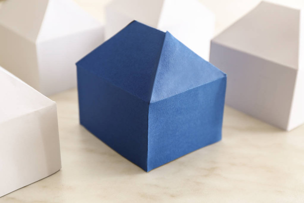 Paper models of houses on table - Photo, Image