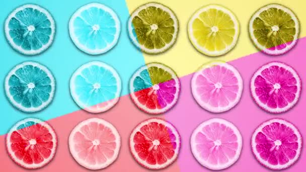 abstrakte Farbanimation von Zitrone und Grapefruit auf verschiedenen Pastellhintergründen - Filmmaterial, Video