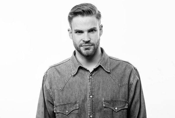 Hipster in denim shirt looks attractive white background. Man well groomed beard and confident face. Well groomed macho. Barber and beard care. Beard grooming salon. Barber salon. Beard grooming - Foto, Imagem