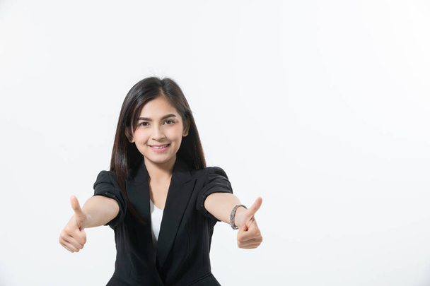 Asian business women are smiling and Thump up hand sign for work - Fotó, kép