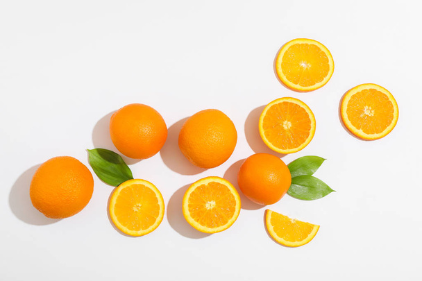Flat lay composition with oranges and space for text on white ba - Foto, imagen