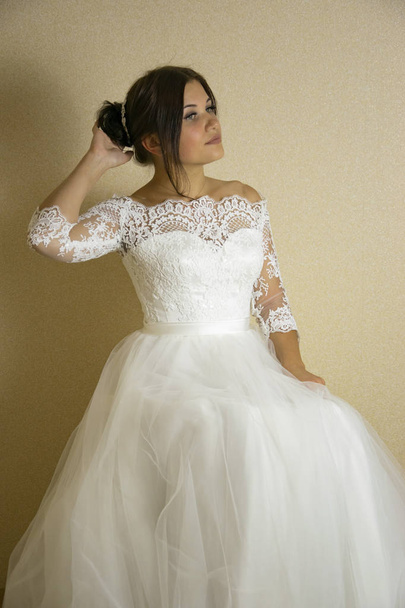 Bride in a wedding dress - Фото, изображение