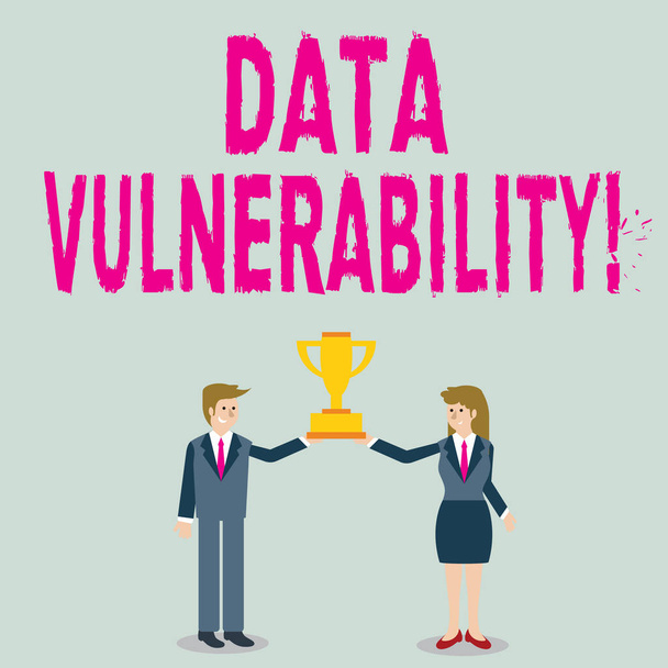 Word writing text Data Vulnerability. Business concept for weakness of a data which can be exploited by an attacker Man and Woman in Business Suit Holding Together the Championship Trophy Cup. - Photo, Image